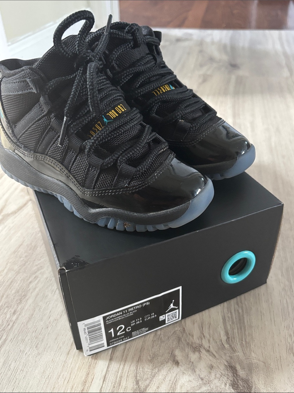 Jordan Kids Black with Ice Blue Outsole Retro 11 Sneakers
